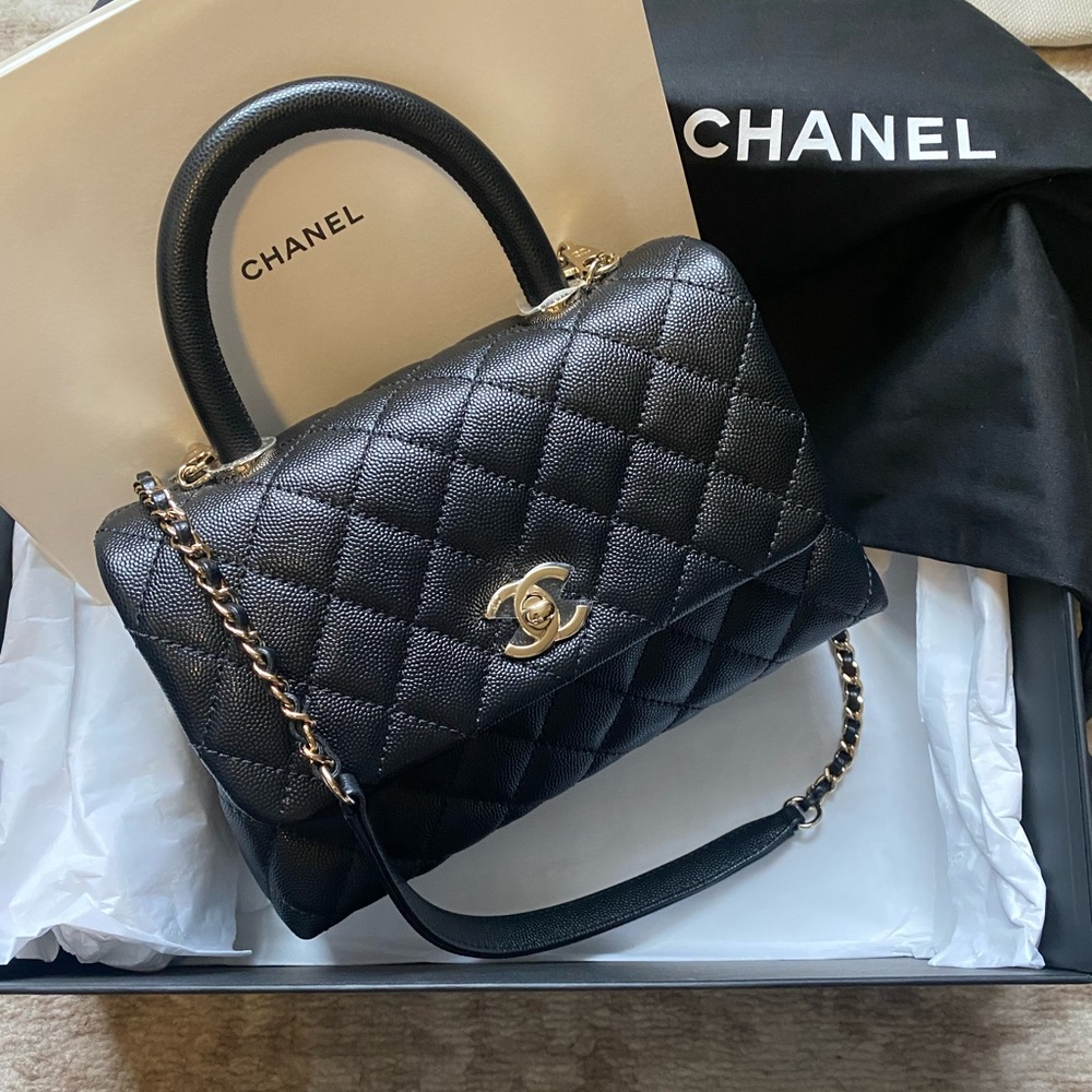 CHANEL
Caviar Mini Coco Handle Bag
